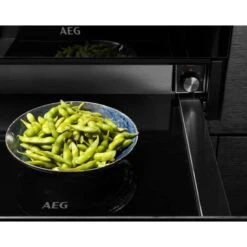 AEG KDK911424M 14cm Warming Drawer - Black Glass & Stainless Steel 21 AEG KDK911424M 14cm Warming Drawer - Black Glass & Stainless Steel -Home Kitchen aeg kdk911424m warmed greens front view